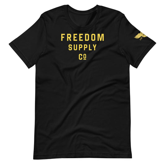Black t-shirt with Freedom Supply Co text in yellow with sidearm Live Free badge