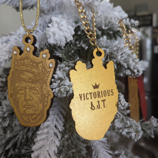 Victorious Gold Ornament On Tree